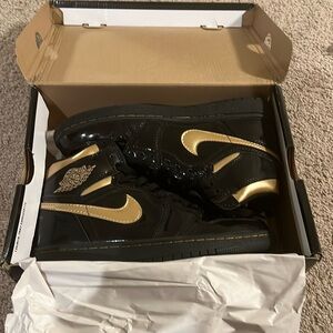 Jordan 1 Metallic Gold and Black